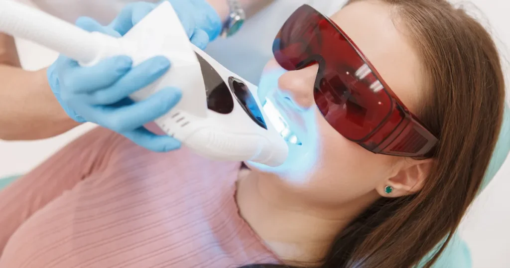 Woman Getting Teeth Whitened